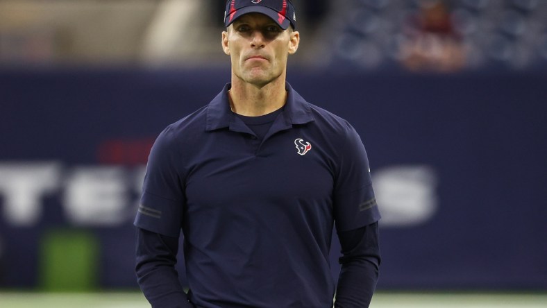 Sep 23, 2021; Houston, Texas, USA; Houston Texans general manager Nick Caserio walks on the field before the game against the Carolina Panthers at NRG Stadium. Mandatory Credit: Troy Taormina-USA TODAY Sports