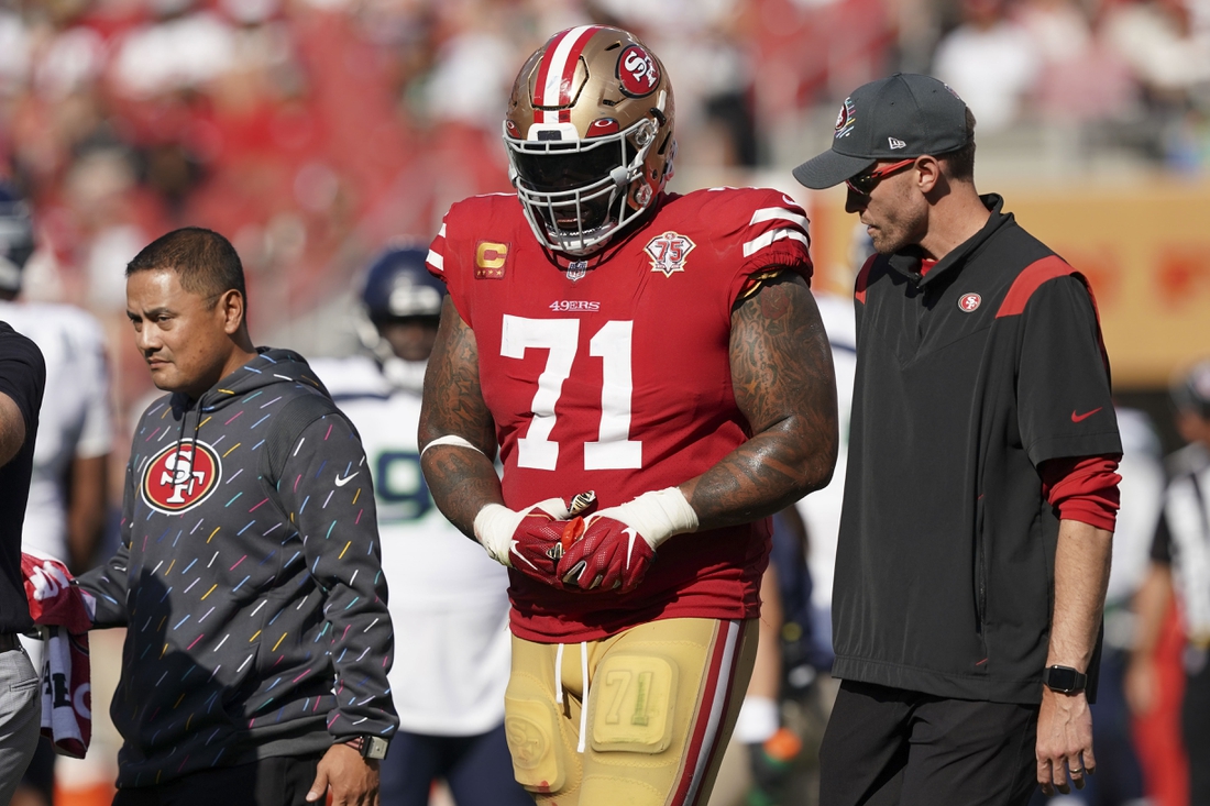 San Francisco 49ers offensive tackle Trent Williams (71) walks off