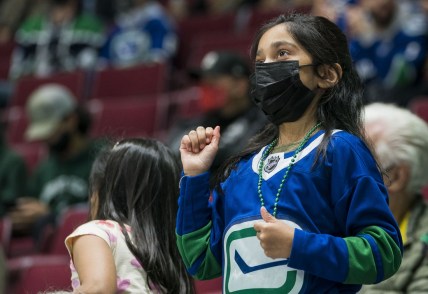 Oct 3, 2021; Vancouver, British Columbia, CAN;  Happy Vancouver fans allowed to return to the arena for the first time in 18 months due to Covid restrictions during a game between the Vancouver Canucks and the Winnipeg Jets at Rogers Arena. Canucks won 3-2.  Mandatory Credit: Bob Frid-USA TODAY Sports