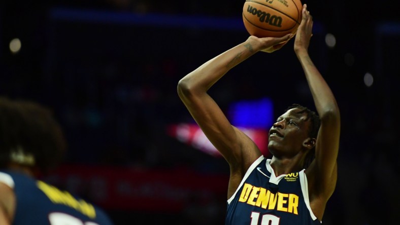 Oct 4, 2021; Los Angeles, California, USA; Denver Nuggets center Bol Bol (10) shoots a free throw against the Los Angeles Clippers during the second half at Staples Center. Mandatory Credit: Gary A. Vasquez-USA TODAY Sports