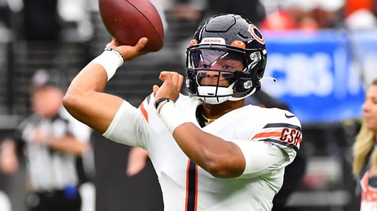 Oct 10, 2021; Paradise, Nevada, USA;  Chicago Bears quarterback Justin Fields (1) warms up before a game against the Las Vegas Raiders at Allegiant Stadium. Mandatory Credit: Stephen R. Sylvanie-USA TODAY Sports