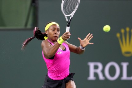 Coco Gauff of the United States returns a shot to Paula Badosa in the first set on Stadium One during the BNP Paribas Open in Indian Wells, Calif., on October 11, 2021.

Gauff Vs Badosa Bnp Paribas2085