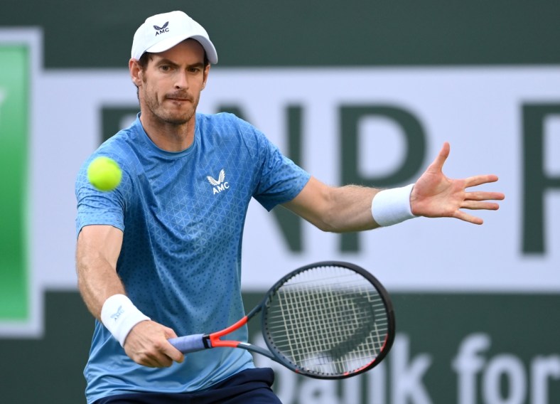 Oct 12, 2021; Indian Wells, CA, USA; Andy Murray (GBR) hits a shot against Alexander Zverev (GER) during a third round match in the BNP Paribas Open at the Indian Wells Tennis Garden. Mandatory Credit: Jayne Kamin-Oncea-USA TODAY Sports