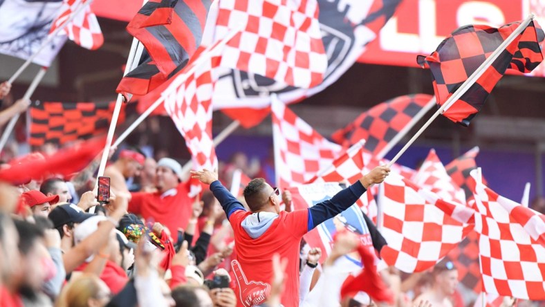 Oct 17, 2021; Harrison, New Jersey, USA;  New York Red Bulls fans celebrate the 1-0 win over New York City after the match at Red Bull Arena. Mandatory Credit: Dennis Schneidler-USA TODAY Sports