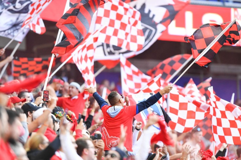 Oct 17, 2021; Harrison, New Jersey, USA;  New York Red Bulls fans celebrate the 1-0 win over New York City after the match at Red Bull Arena. Mandatory Credit: Dennis Schneidler-USA TODAY Sports