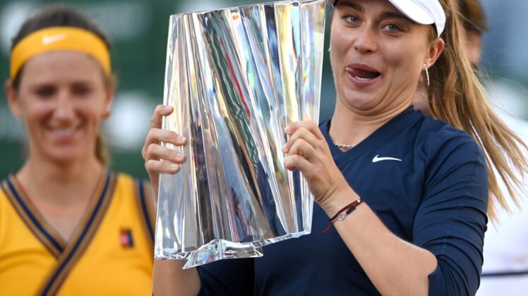 Oct 17, 2021; Indian Wells, CA, USA;  Paula Badosa (ESP) holds the champion trophy after defeating Victoria Azarenka (BLR) in 3 sets n the women   s final in the BNP Paribas Open at the Indian Wells Tennis Garden. Mandatory Credit: Jayne Kamin-Oncea-USA TODAY Sports