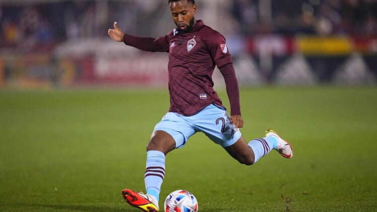 Oct 20, 2021; Commerce City, Colorado, USA; Colorado Rapids midfielder Kellyn Acosta (23) prepares to kick the ball in the first half against the Seattle Sounders at Dick's Sporting Goods Park. Mandatory Credit: Ron Chenoy-USA TODAY Sports
