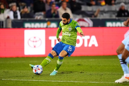 Oct 20, 2021; Commerce City, Colorado, USA; Seattle Sounders midfielder Alex Roldan (16) attempts on the goal of the Colorado Rapids in the second half at Dick's Sporting Goods Park. Mandatory Credit: Ron Chenoy-USA TODAY Sports