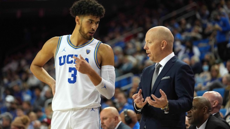 Nov 4, 2021; Los Angeles, CA, USA; UCLA Bruins head coach Mick Cronin (right) talks with guard Johnny Juzang (3) the Chico State  in the second  half at Pauley Pavilion.  Mandatory Credit: Kirby Lee-USA TODAY Sports