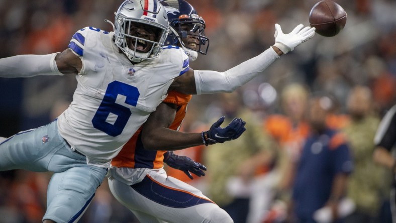 Nov 7, 2021; Arlington, Texas, USA; Dallas Cowboys safety Donovan Wilson (6) breaks up a pass intended for Denver Broncos wide receiver Jerry Jeudy (10) during the second half at AT&T Stadium. Mandatory Credit: Jerome Miron-USA TODAY Sports