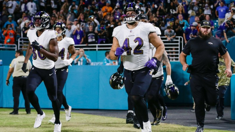 Nov 11, 2021; Miami Gardens, Florida, USA; Baltimore Ravens fullback Patrick Ricard (42) takes on the field prior the game against the Miami Dolphins at Hard Rock Stadium. Mandatory Credit: Sam Navarro-USA TODAY Sports