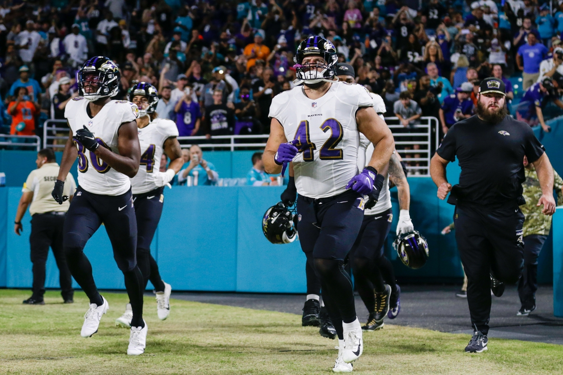 Nov 11, 2021; Miami Gardens, Florida, USA; Baltimore Ravens fullback Patrick Ricard (42) takes on the field prior the game against the Miami Dolphins at Hard Rock Stadium. Mandatory Credit: Sam Navarro-USA TODAY Sports