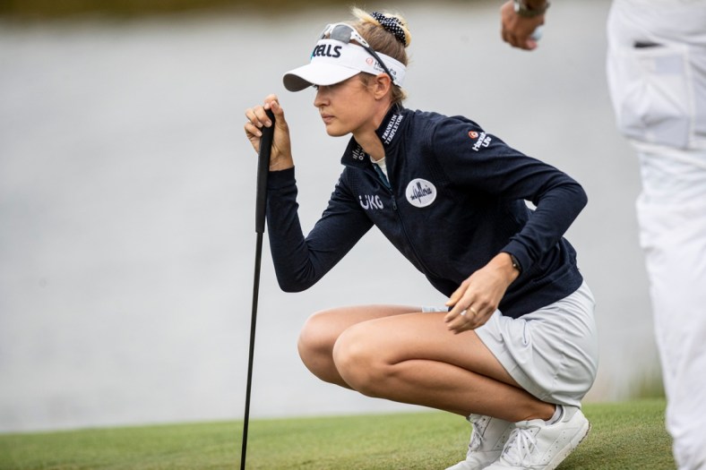 Nelly Korda plays the third round of the CME Group Tour Championship at Ritz Carlton Golf Resort , Tiburon Golf Club in Naples on Saturday, Nov. 20, 2021. She was tied for the lead with several other players.

Nelly0298