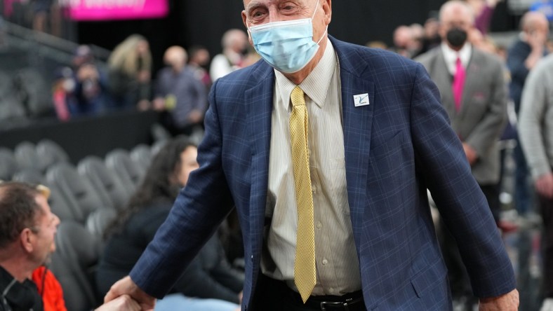 Nov 23, 2021; Las Vegas, Nevada, USA; College basketball commentator Dick Vitale greets fans as he makes his return to work a game between the Gonzaga Bulldogs and the UCLA Bruins at T-Mobile Arena. Mandatory Credit: Stephen R. Sylvanie-USA TODAY Sports