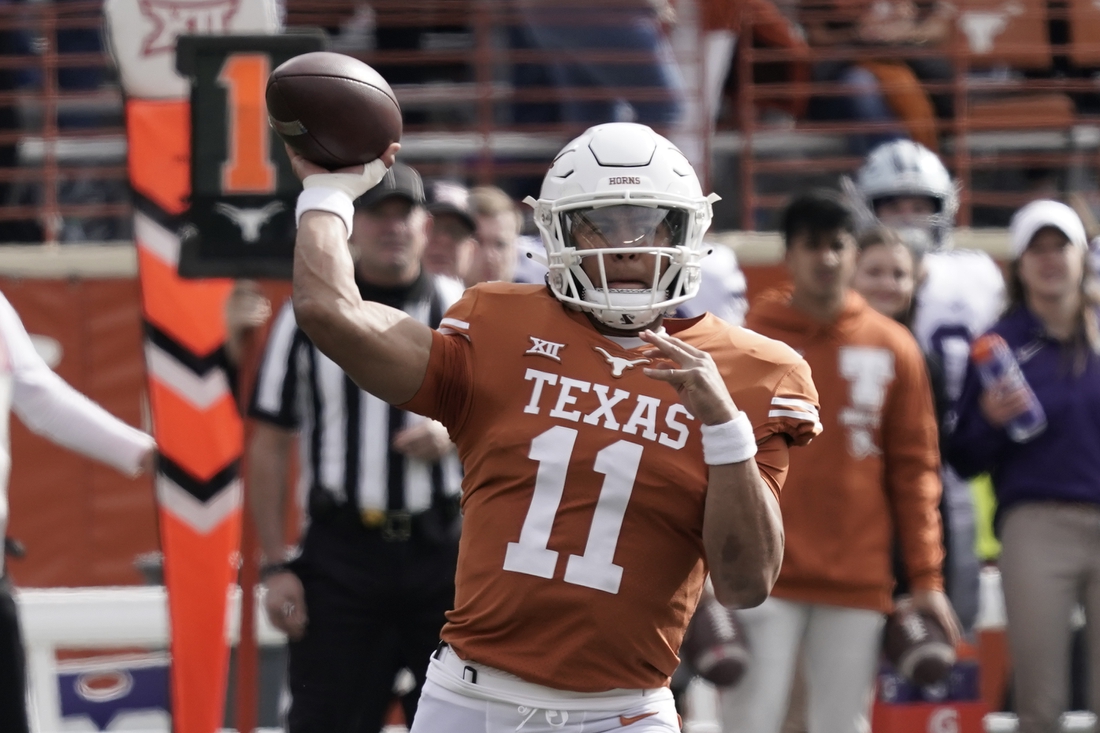 Nov 26, 2021; Austin, Texas, USA; Texas Longhorns quarterback Casey Thompson (11) throws a pass during the first half against the Kansas State Wildcats at Darrell K Royal-Texas Memorial Stadium. Mandatory Credit: Scott Wachter-USA TODAY Sports