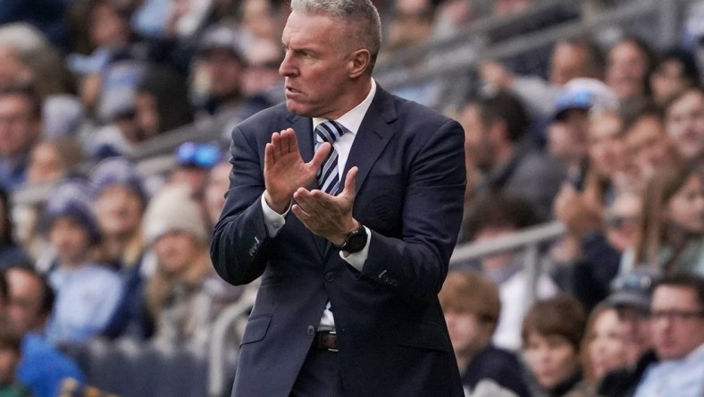 Nov 28, 2021; Kansas City, MO, USA; Sporting Kansas City head coach Peter Vermes  reacts to play against Real Salt Lake in the conference semifinals of the 2021 MLS playoffs at Children's Mercy Park. Mandatory Credit: Denny Medley-USA TODAY Sports