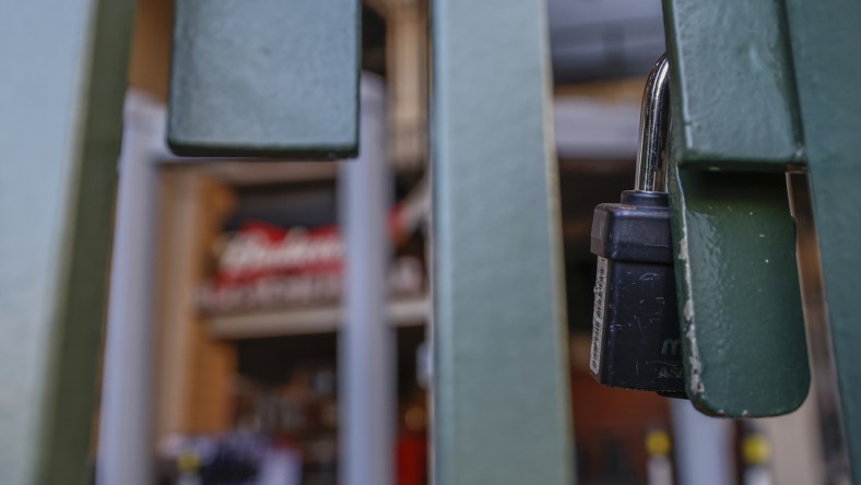 Dec 2, 2021; Chicago, IL, USA; Locked gate to Wrigley Field is seen on the first day of Major League Baseball lockout. Mandatory Credit: Kamil Krzaczynski-USA TODAY Sports