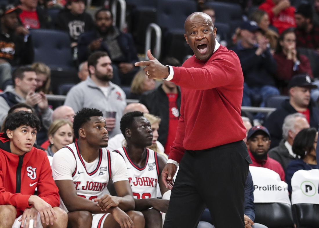 Dec 3, 2021; Elmont, New York, USA; St. John   s head coach Mike Anderson yells out instructions in the second half against the Kansas Jayhawks at UBS Arena. Mandatory Credit: Wendell Cruz-USA TODAY Sports