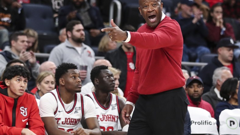 Dec 3, 2021; Elmont, New York, USA; St. John   s head coach Mike Anderson yells out instructions in the second half against the Kansas Jayhawks at UBS Arena. Mandatory Credit: Wendell Cruz-USA TODAY Sports