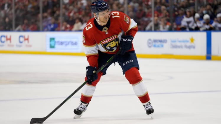 Dec 4, 2021; Sunrise, Florida, USA; Florida Panthers center Sam Reinhart (13) controls the puck against the St. Louis Blues during the second period at FLA Live Arena. Mandatory Credit: Jasen Vinlove-USA TODAY Sports