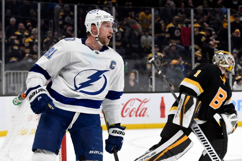 Dec 4, 2021; Boston, Massachusetts, USA; Tampa Bay Lightning center Steven Stamkos (91) reacts after scoring the game winning goal against Boston Bruins goaltender Jeremy Swayman (1) during an overtime period at the TD Garden. Mandatory Credit: Brian Fluharty-USA TODAY Sports
