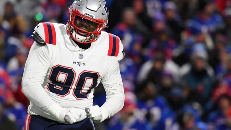 Dec 6, 2021; Orchard Park, New York, USA; New England Patriots defensive end Christian Barmore (90) reacts to a defensive play against the Buffalo Bills during the first half at Highmark Stadium. Mandatory Credit: Rich Barnes-USA TODAY Sports