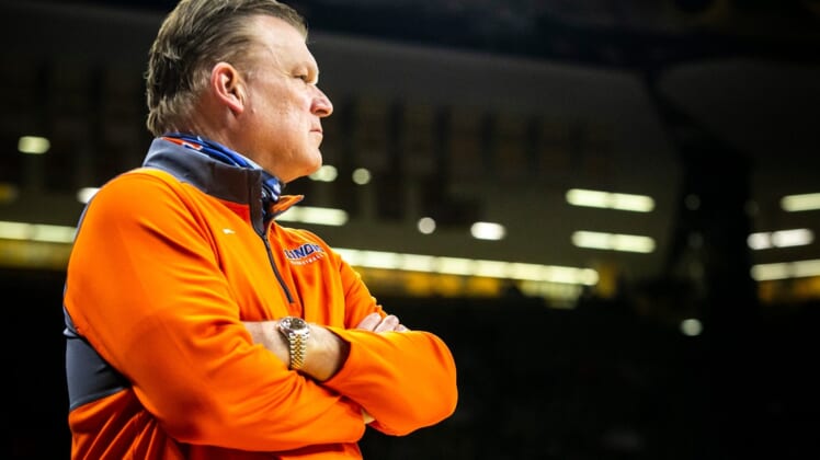 Illinois head coach Brad Underwood watches from the baseline during a NCAA Big Ten Conference men's basketball game against Iowa, Monday, Dec. 6, 2021, at Carver-Hawkeye Arena in Iowa City, Iowa.211206 Ill Iowa Mbb 034 Jpg