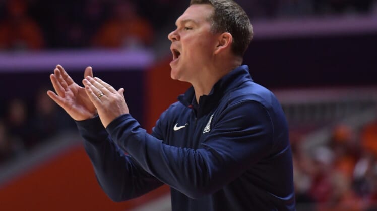 Dec 11, 2021; Champaign, Illinois, USA;  Arizona Wildcats head coach Tommy Lloyd directs his players during the first half against the Illinois fighting Illini at State Farm Center. Mandatory Credit: Ron Johnson-USA TODAY Sports