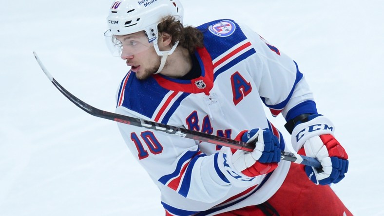 Dec 15, 2021; Glendale, Arizona, USA; New York Rangers left wing Artemi Panarin (10) skates against the Arizona Coyotes during the first period at Gila River Arena. Mandatory Credit: Joe Camporeale-USA TODAY Sports