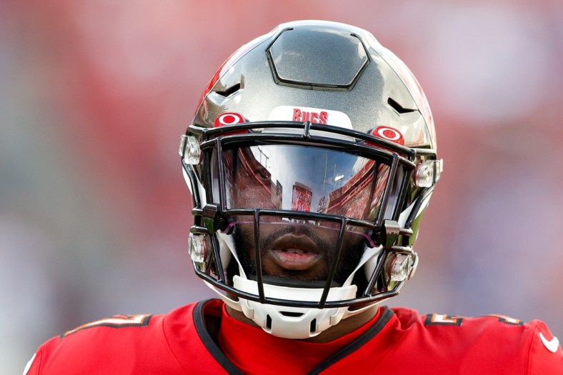 Dec 12, 2021; Tampa, Florida, USA;  Tampa Bay Buccaneers running back Leonard Fournette (7) looks on prior to a game against the Buffalo Bills at Raymond James Stadium. Mandatory Credit: Nathan Ray Seebeck-USA TODAY Sports