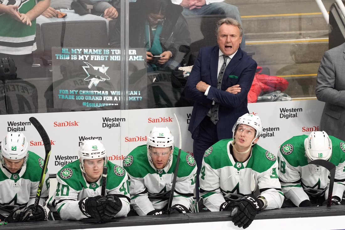 Dec 11, 2021; San Jose, California, USA; Dallas Stars head coach Rick Bowness talks on the bench during the third period against the San Jose Sharks at SAP Center at San Jose. Mandatory Credit: Darren Yamashita-USA TODAY Sports