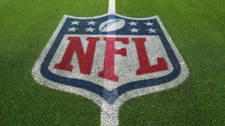 Dec 16, 2021; Inglewood, California, USA; A detailed view of the NFL shield logo on the field at SoFi Stadium. Mandatory Credit: Kirby Lee-USA TODAY Sports