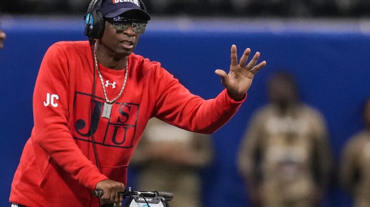 Dec 18, 2021; Atlanta, GA, USA; Jackson State Tigers head coach Deion Sanders reacts on the sidelines against the South Carolina State Bulldogs during the first half during the 2021 Celebration Bowl at Mercedes-Benz Stadium. Mandatory Credit: Dale Zanine-USA TODAY Sports
