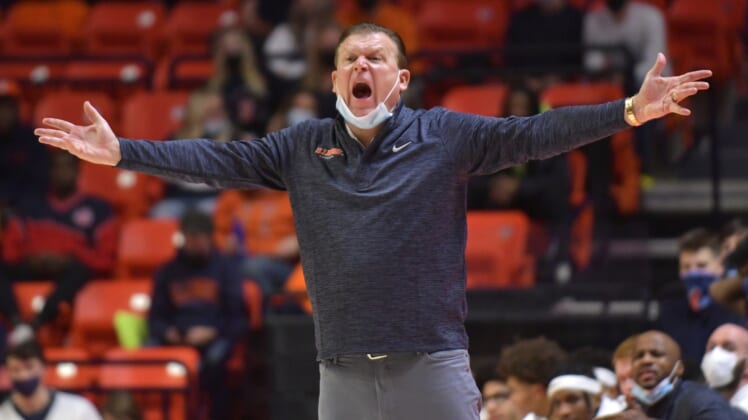 Dec 18, 2021; Champaign, Illinois, USA;  Illinois Fighting Illini head coach Brad Underwood directs his players during the second half against the Saint Francis Red Flash at State Farm Center. Mandatory Credit: Ron Johnson-USA TODAY Sports