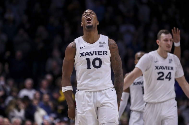 Dec 18, 2021; Cincinnati, Ohio, USA; Xavier Musketeers guard Nate Johnson (10) reacts after making a three point basket against the Marquette Golden Eagles in the second half at Cintas Center. Mandatory Credit: Katie Stratman-USA TODAY Sports