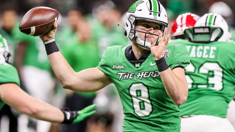 Dec 18, 2021; New Orleans, LA, USA;  Marshall Thundering Herd quarterback Grant Wells (8) passes the ball against Louisiana-Lafayette Ragin Cajuns during the first half of the 2021 New Orleans Bowl at Caesars Superdome. Mandatory Credit: Stephen Lew-USA TODAY Sports