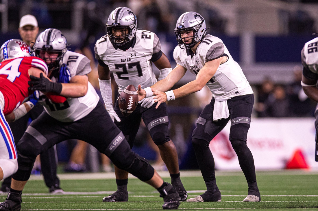 Guyer quarterback Jackson Arnold (11) snaps the ball against Westlake during the Class 6A Division 2 State Championship game at AT&T Stadium in Arlington, Texas on Dec. 18, 2021. Westlake defeated Guyer 40-21.

Aem Westlake Vs Guyer 11