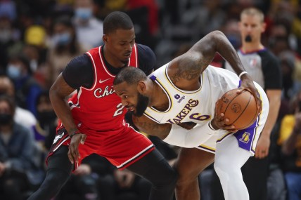 Dec 19, 2021; Chicago, Illinois, USA; Chicago Bulls forward Javonte Green (24) defends against Los Angeles Lakers forward LeBron James (6) during the first half at United Center. Mandatory Credit: Kamil Krzaczynski-USA TODAY Sports