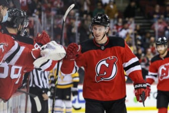Dec 19, 2021; Newark, New Jersey, USA; New Jersey Devils right wing Nathan Bastian (14) celebrates his goal with teammates during the third period against the Pittsburgh Penguins at Prudential Center. Mandatory Credit: Vincent Carchietta-USA TODAY Sports
