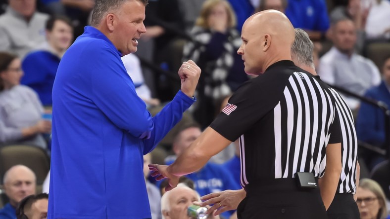 Dec 14, 2021; Omaha, Nebraska, USA;  Creighton Bluejays head coach Greg McDermott talks with the officials in the game against the Arizona State Sun Devils in the first half at CHI Health Center Omaha. Mandatory Credit: Steven Branscombe-USA TODAY Sports