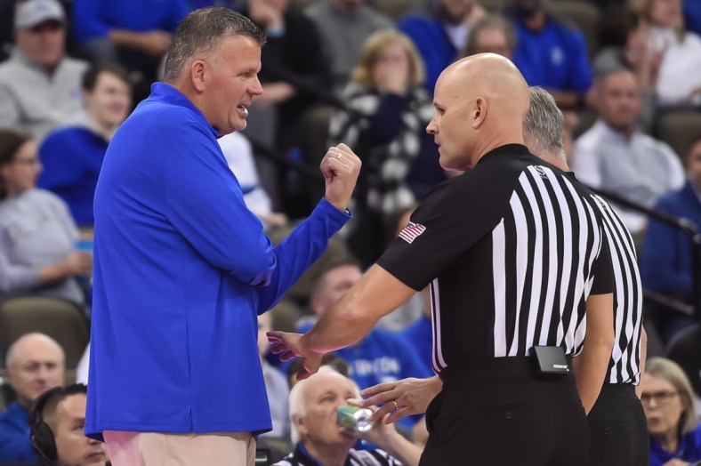 Dec 14, 2021; Omaha, Nebraska, USA;  Creighton Bluejays head coach Greg McDermott talks with the officials in the game against the Arizona State Sun Devils in the first half at CHI Health Center Omaha. Mandatory Credit: Steven Branscombe-USA TODAY Sports
