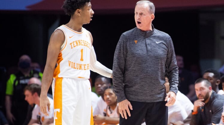Tennessee Head Coach Rick Barnes speaks with Tennessee guard Kennedy Chandler (1) during a basketball game between the Tennessee Volunteers and the Arizona Wildcats at Thompson-Boling Arena in Knoxville, Tenn., on Wednesday, Dec. 22, 2021.Kns Vols Arizona Hoops Bp