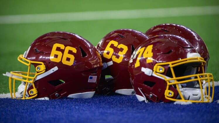 Dec 26, 2021; Arlington, Texas, USA; A view of the helmets of Washington Football Team offensive tackle David Steinmetz (66) and center Beau Benzschawel (63) before the game between the Dallas Cowboys and the Washington Football Team at AT&T Stadium. Mandatory Credit: Jerome Miron-USA TODAY Sports