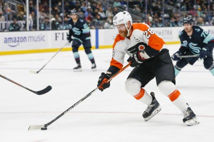 Dec 29, 2021; Seattle, Washington, USA; Philadelphia Flyers center Claude Giroux (28) skates with the puck against the Seattle Kraken during the second period at Climate Pledge Arena. Mandatory Credit: Joe Nicholson-USA TODAY Sports