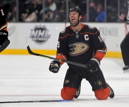 Dec 29, 2021; Anaheim, California, USA;  Anaheim Ducks center Ryan Getzlaf (15) reacts after he was called for tripping on Vancouver Canucks center Tyler Motte (64) in the second period of the game at Honda Center. Mandatory Credit: Jayne Kamin-Oncea-USA TODAY Sports