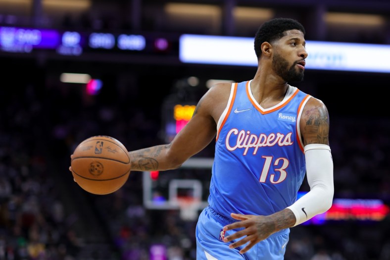 Dec 22, 2021; Sacramento, California, USA; Los Angeles Clippers guard Paul George (13) during the game against the Sacramento Kings at Golden 1 Center. Mandatory Credit: Sergio Estrada-USA TODAY Sports