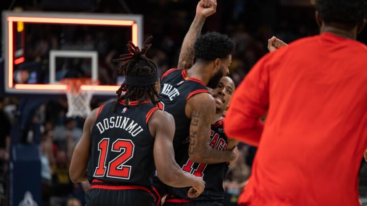 Dec 31, 2021; Indianapolis, Indiana, USA; Chicago Bulls forward DeMar DeRozan (11) celebrates his game winning basket with teammates as time expires against the Indiana Pacers at Gainbridge Fieldhouse. Mandatory Credit: Trevor Ruszkowski-USA TODAY Sports