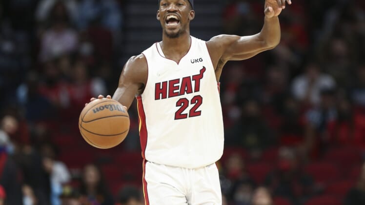 Dec 31, 2021; Houston, Texas, USA; Miami Heat forward Jimmy Butler (22) brings the ball up the court during the third quarter against the Houston Rockets at Toyota Center. Mandatory Credit: Troy Taormina-USA TODAY Sports