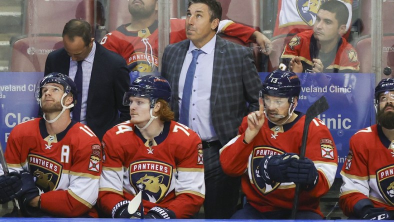 Jan 1, 2022; Sunrise, Florida, USA; Florida Panthers head coach Andrew Brunette watches from the sideline against the Montreal Canadiens during the third period at FLA Live Arena. Mandatory Credit: Sam Navarro-USA TODAY Sports