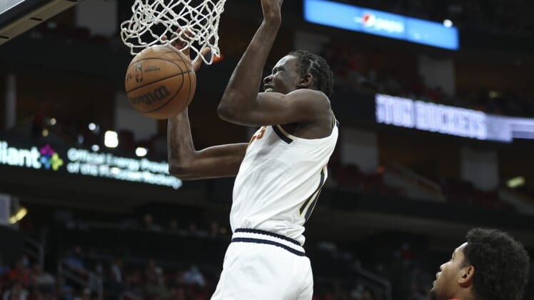 Jan 1, 2022; Houston, Texas, USA; Denver Nuggets center Bol Bol (10) dunks the ball during the fourth quarter against the Houston Rockets at Toyota Center. Mandatory Credit: Troy Taormina-USA TODAY Sports